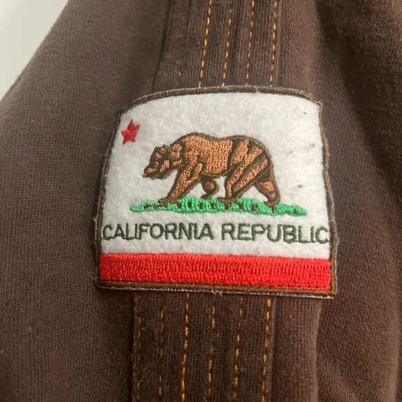 The Northface zip up jacket. Brown, orange trim, size Large (fits medium). - Picture 4 of 9